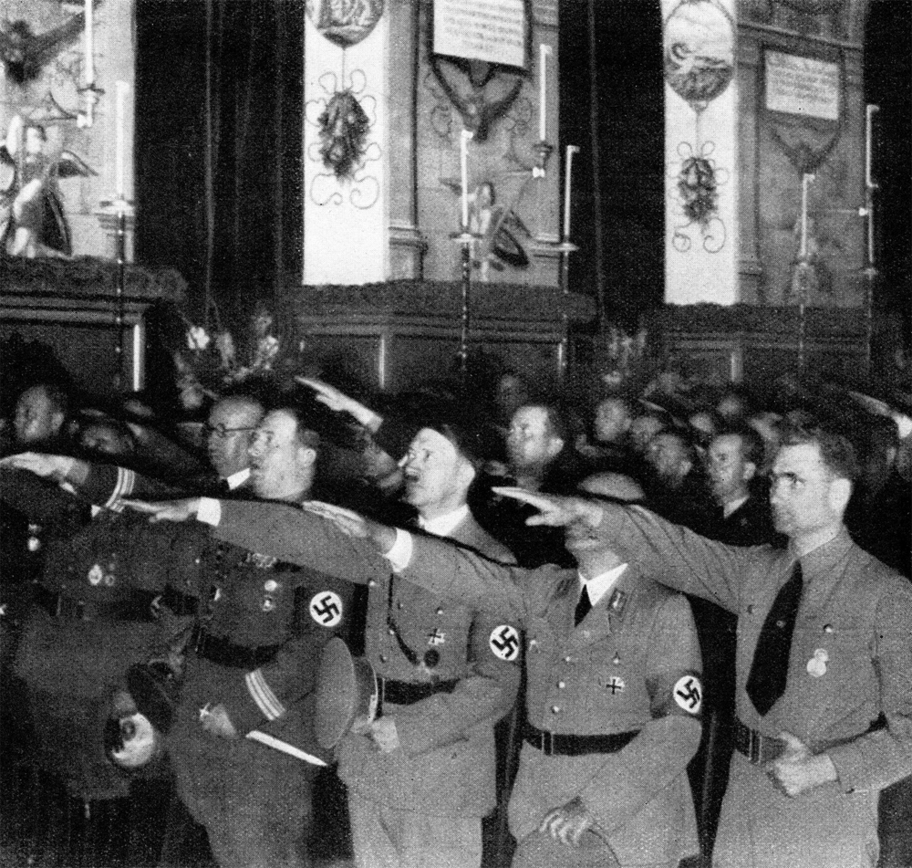 Party members salute as the Horst Wessel Lied (anthem of the party) is played at the opening of the 8th Reichsparteitag in Nuremberg's town hall Party members salute as the Horst Wessel Lied (anthem of the party) is played at the opening of the 8th Reichsparteitag in Nuremberg's town hall